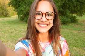 young woman taking selfie