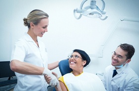 Happy patient at appointment for preventive dental care