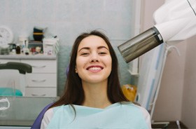 Dental patient smiling in treatment chair