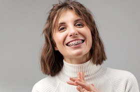 smiling woman with braces