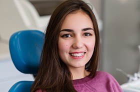 Woman in dental chair with braces