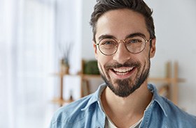 Smiling man enjoying the benefits of root canal therapy