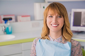 Smiling dental patient with red hair