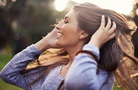 woman smiling outside