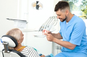 dentist talking with patient