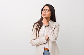 Portrait of woman with thoughtful, curious expression on her face