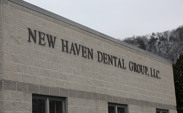 New Have Dental Group sign on building