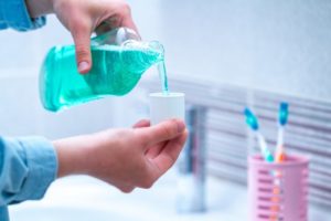 Using mouthwash to prevent dental implant failure New Haven