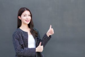 Professional woman with braces on her teeth